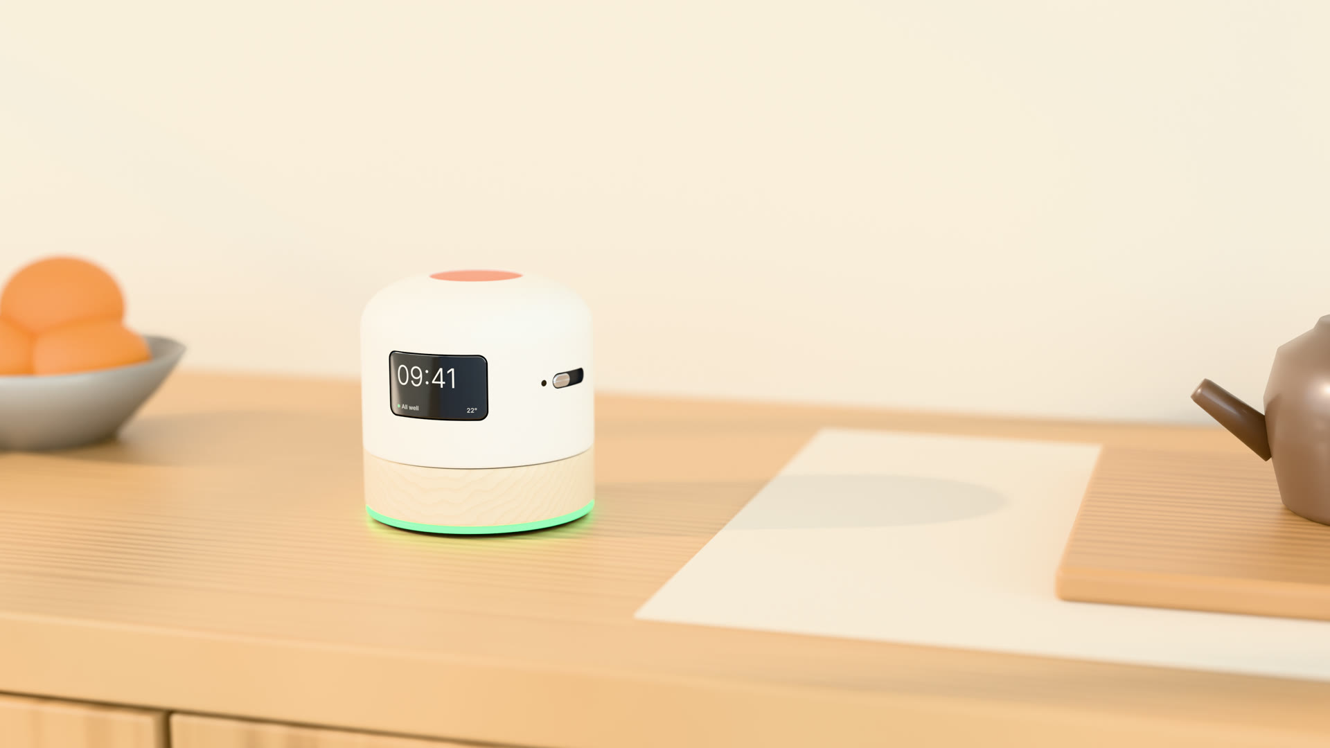 Concept render of the Mamori device on a wooden sideboard in a calm home, next to a fruit bowl and a teapot